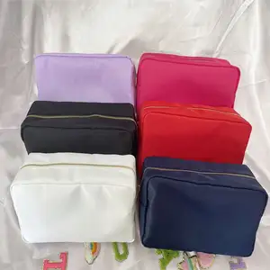 Nuova borsa da toilette in nylon resistente asciugamano da donna ricamo luminoso lettera colorata trucco scatola per trucco borsa cosmetica di grande capacità