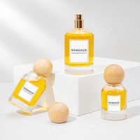 Flacon de parfum rechargeable en verre transparent 30ml 50ml 100ml avec boîte cadeau rigide ronde de luxe pour une image de marque de parfum haut de gamme