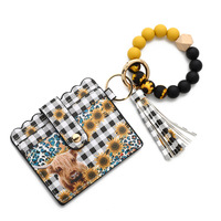 Vente chaude Bien Nouveaux Designs Tendance De La Mode Léopard Vache Motif Silicone Perles Bracelet Porte-clés Bracelet Avec Portefeuille En Cuir