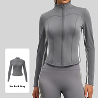 Veste de sport chic pour femme, coupe ajustée, à rayures contrastées, col montant, fermeture éclair, manches longues, idéale pour le yoga, l'entraînement et le jogging