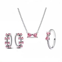 Nouvelle Collection : Parure de Bijoux Classique Rose avec Nœud, Cœur et Strass en Cristal – Collier, Boucles d'Oreilles, Bracelet et Bague Plaqué Argent – Cadeau de Fiançailles