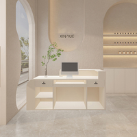 Comptoir de réception en forme de L de luxe avec éclairage LED, armoire de rangement, comptoir d'accueil commercial pour salon de beauté, comptoir de réception haut de gamme