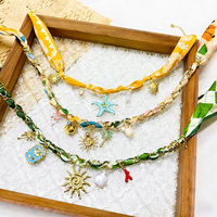 MusesJewels – Collier pendentif en acier inoxydable avec fleur de soleil délicate, fait main, perle naturelle, bijoux pour femme, cadeau