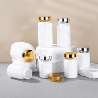 Récipient de capsule PET blanc personnalisé avec bouchon en or bouteille vide en plastique de supplément de vitamine pilule pour la médecine emballage de qualité