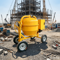 Bétonnière portable 350/500L en stock avec cadre en acier et tambour à coulée facile pour travaux de réparation extérieurs à domicile