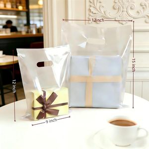 Clear <b>Plastic</b> Gift <b>Bags</b> With Handles 9x12 Inches 100 Pack For Shopping And Merchandise <b>Storage</b> - Product Image 6
