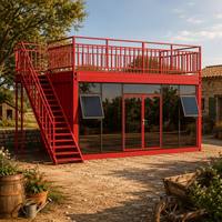 Maison conteneur préfabriquée en kit de 20 et 40 pieds avec mur-rideau en verre, escalier à rampe, extensible, design moderne