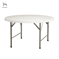 Table ronde pliable en plastique robuste avec poignée de transport pour les fêtes et la restauration