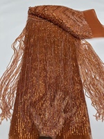 Tissu en dentelle brodée de perles et de paillettes vert émeraude - Luxe élégant pour robes de soirée