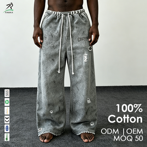 Pantalon de survêtement large pour homme, effet usé et déchiré, taille effilochée, ourlet brut, coupe ample, cordon de serrage, style streetwear, personnalisable OEM - Product Image 1