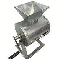 Machine à décortiquer les cacahuètes à commande manuelle