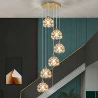 Lustre long pour escalier, luminaire de luxe en fer forgé, style nordique simple et moderne, pour villa, pavillon, restaurant rotatif, LED central