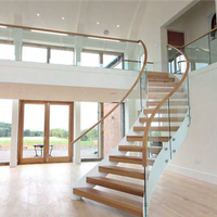 Escalier à poutres courbées Prima Modern, avec des marches à courbure lisse pour une décoration visuelle haut de gamme du hall