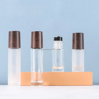 5ml 10ml 15ml Bouteilles à rouleaux de parfum en verre Roll-On avec couvercle en bois pour sérum de soin de la peau Commande minimale 100 pièces