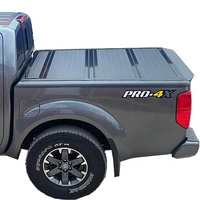 Couverture de benne rigide pliable en trois parties en alliage d'aluminium à profil bas pour Dodge Ram 2014-2026 avec Ram Box 5.7