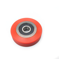 Accessoires de machine de plaquage de chant automatique roue en caoutchouc à tête plate roue de suivi Nanxingji rouleau de pression d'alimentation