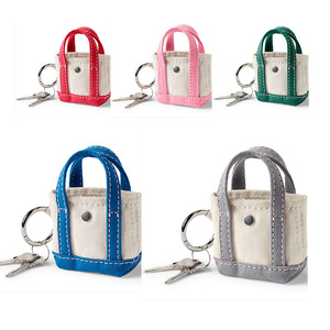 Bolso mini tote de lona con bloques de color, bolso para auriculares, bolso para pintalabios - Product Image 1