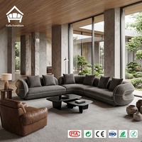 Canapé modulaire sculptural incurvé de designer, en bouclette crème, en forme de L, pour la décoration intérieure, projet personnalisé pour toute la maison