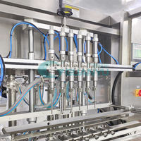 Machine de remplissage électrique entièrement automatique de haute précision en acier inoxydable Guanyu pour le remplissage et le bouchage de savon liquide et de sauce piquante