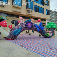 Accessoires de scène personnalisés, arche gonflable pour parc d'attractions avec décoration de champignons, fleurs, papillons et pays féerique