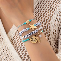 Accessoires de mode pour femme, style bohème coloré, vacances d'été, vie marine, bracelet et collier tressés.