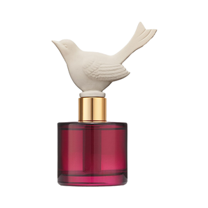 Fragancia de pájaro de cerámica personalizada 100mL Botella cilíndrica roja Difusor de cerámica - Product Image 1