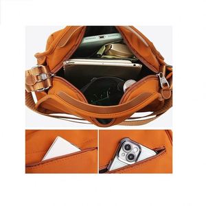 Bolso Bandolera Espacioso de Nailon con Múltiples Bolsillos Interiores y Compartimento Grande para Guardar Artículos Esenciales Diarios - Product Image 4