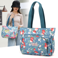Sac à main pour femme de luxe décontracté de haute qualité personnalisé Grande capacité Imperméable à l'eau Sac à main à fermeture éclair tendance Nouveau design