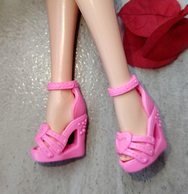 Silver pink-shoes worn by petite barbie doll as picture