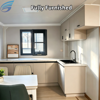 Maison conteneur préfabriquée extensible avec cuisine et 2 chambres, utilisation extérieure, design moderne, écologique, construction rapide, clé en main