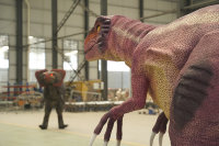 Costume de dinosaure Vélociraptor rose rayé populaire de Zigong, léger, avec pattes cachées, tailles personnalisées, CET, pour centres commerciaux et aéroports