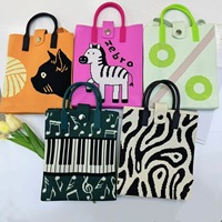 Nouveau sac à téléphone en tricot jacquard à motifs de dessins animés, sac à bandoulière tendance pour femmes, sac à main en tricot à motifs d'animaux avec logo