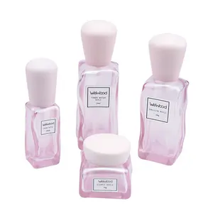 Groothandel Unieke Roze Lotion Cosmetica Vloeibare Verpakking Glazen Fles Met Houten Doppen