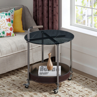 Table basse moderne en verre trempé avec pieds en métal |   Table basse ronde à roulettes avec système de poussée et de traction