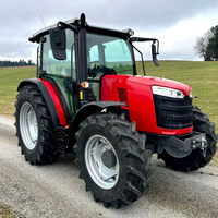 Tracteur diesel Massey Ferguson M 4708 à usage agricole, couleur rouge, pneus larges