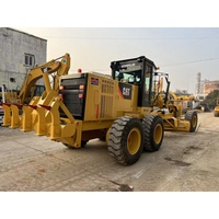 Matériel de construction en bon état, niveleuse Caterpillar 140H d'occasion
