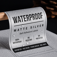 Metallisch Silberne Gebürstete Effekt-Klebeetiketten für Parfümverpackungen Kundenspezifische Größenrollen - Umweltfreundlich & Wasserfest