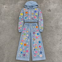Ensemble décontracté homme en jean délavé avec motif Smiley et détails déchirés, style streetwear, fabrication OEM ODM
