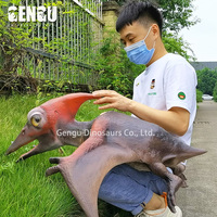 Modèle animatronique personnalisé, marionnette de dinosaure bébé à commande manuelle pour une utilisation en intérieur/extérieur dans les centres commerciaux, les parcs d'aventure