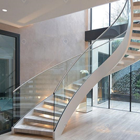 Escaliers Courbes de Style Luxe avec Garde-Corps en Verre Trempé Escaliers Courbes de Style Minimaliste pour Bâtiments Résidentiels