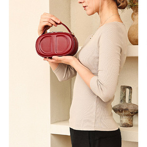 Elegant Women's Genuine Leather Oval <b>Mini</b> Bag With Round Handle Zip Closure Daily Use Handbag - Product Image 3