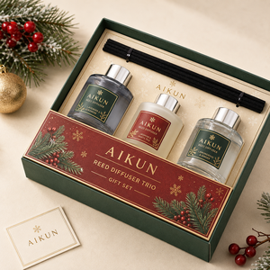 Aikun 2 Bottle Christmas Scented Glass <b>Reed</b> <b>Diffuser</b> Gift Set Packed with <b>Black</b> Fiber Sticks in Printed Box for Holiday Gifting - Product Image 2