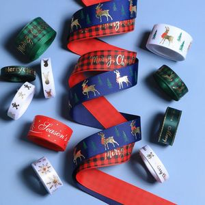 Feestlinten klaar voor verzending: satijnen lint, polyester lint, bloemenlint, grosgrain lint, kerstlint in rood en groen met gouden logo. - Product Image 2
