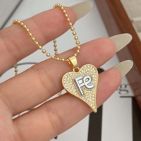 Collier tendance en cuivre plaqué or 18 carats bicolore avec zircon en forme de cœur et croix, motif Madone, populaire à l'international