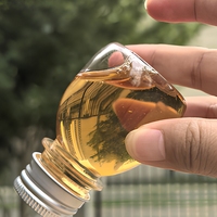 Mini bouteilles vides en plastique transparent de 2 oz avec bouchons en aluminium et inviolables Petit pot de contenants de jus transparent