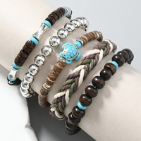Bracelet rétro DIY multi-couches en fil élastique avec perles en bois et coquille de noix de coco, idéal pour les rendez-vous, les fêtes et les cadeaux.