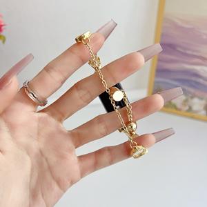 <span class=keywords><strong>Bracelet</strong></span> pour <span class=keywords><strong>Apple</strong></span> <span class=keywords><strong>Watch</strong></span> - IWatch 11/10 SE 9 8 7 6 5 4 <span class=keywords><strong>Bracelet</strong></span> à fermoir en acier inoxydable avec perles métalliques rondes et design coquillage - Product Image 2