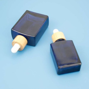 Sang Trọng Phẳng Vuông Hình Chữ Nhật 15Ml 100Ml Mỹ Phẩm Màu Xanh Huyết Thanh Chai Màn Hình In Ấn Tùy Chỉnh Tinh Dầu Thủy Tinh Nhỏ Giọt - Product Image 6