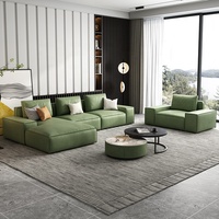 Modernes Anpassbares Stoff-Ecksofa Modulares Sofa Boucle Konvertierbares L-förmiges Wohnzimmer-Sofa Weiße Lagerhaus-Werkstatt Holzbeine