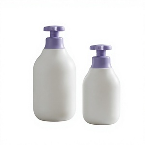 ขวดโลชั่น HDPE ทรงกลม 350 มล. 600 มล. ภาชนะพลาสติกสีขาวพร้อมหัวปั๊มสำหรับแชมพูและครีมอาบน้ำ ผู้ผลิตจากเวียดนาม - Product Image 1